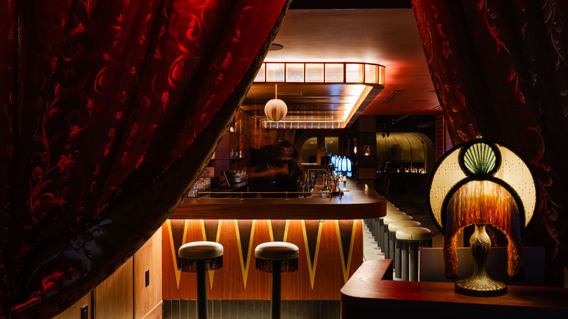 A Restaurant With Red Curtains