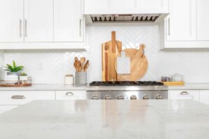 A beautiful modern farmhouse kitchen with stainless steel appliances.