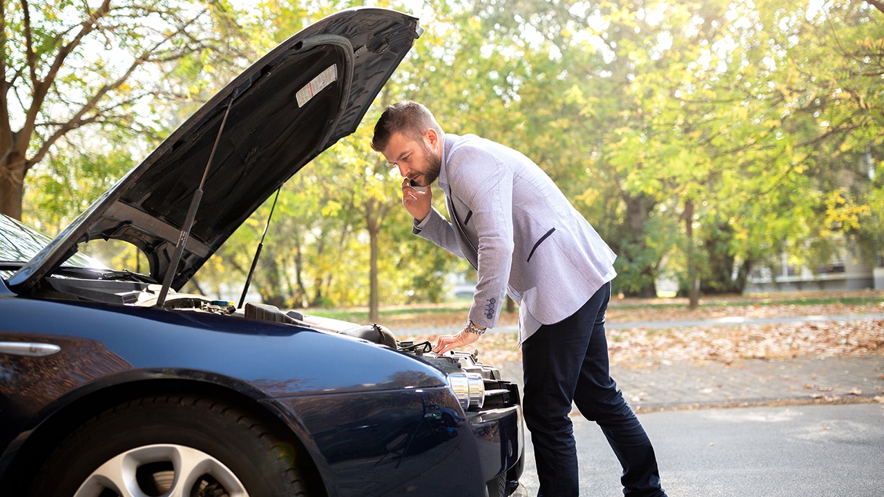 Fancy new car broke down leaving a poor guy stranded on his way to work, problems on the road