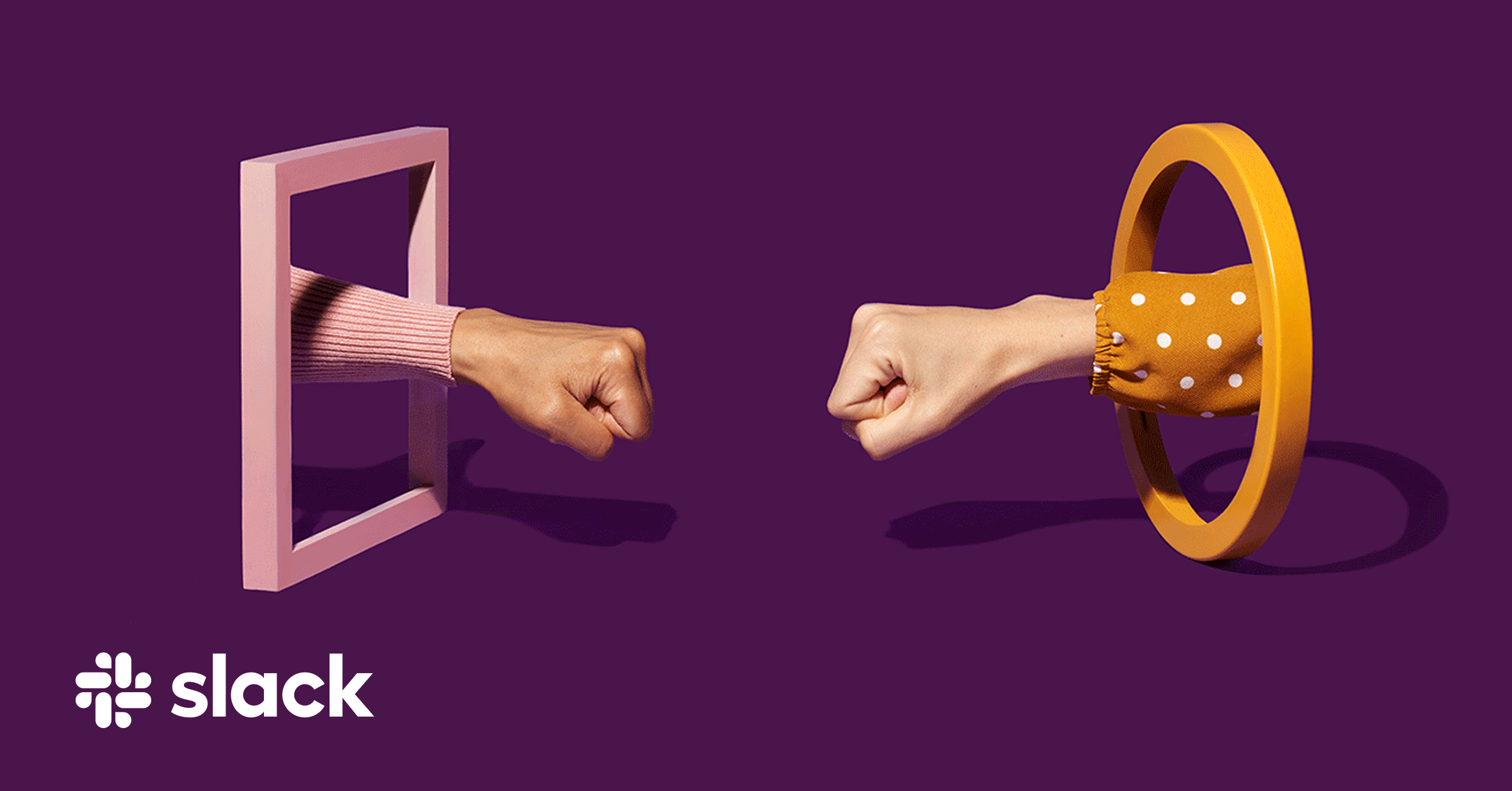 Two arms giving a fist pound representing collaboration