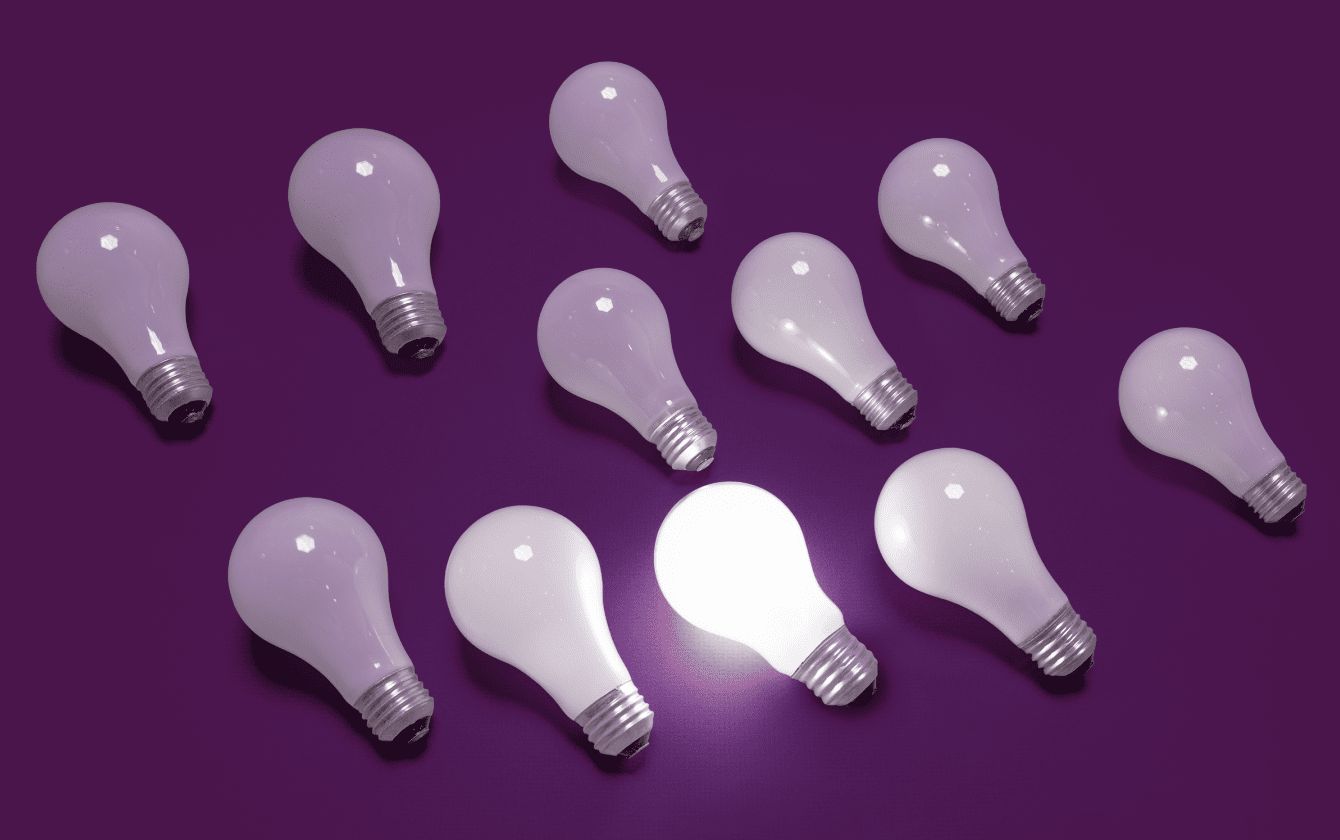 Light bulbs with one lit for getting started in Slack