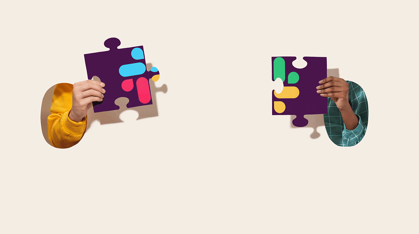 Two hands putting together a puzzle piece representing connection
