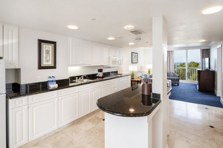 A Kitchen With A Sink And A Window