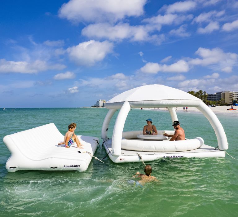 A Group Of People On A Boat In The Water