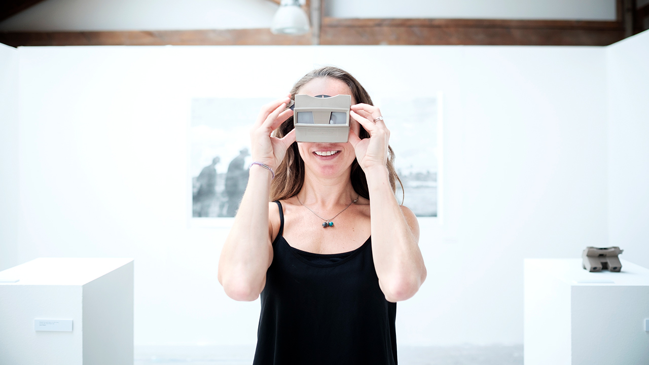 Laura Rosser holding a view finder camera