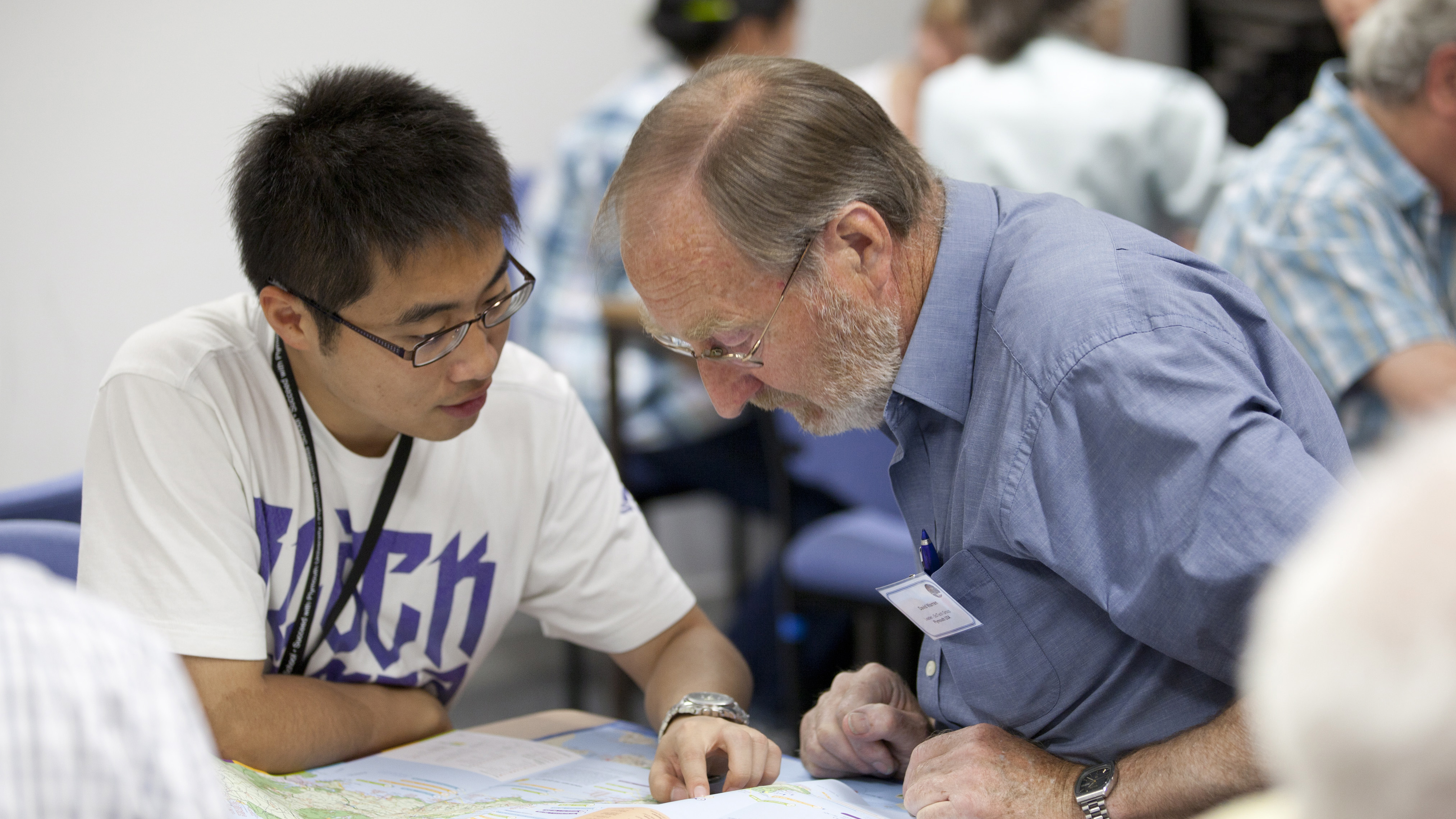 A member of the University of the Third Age mentoring a University of Plymouth student.