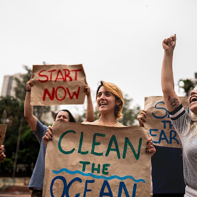 Group of people protesting for an environmental cause.