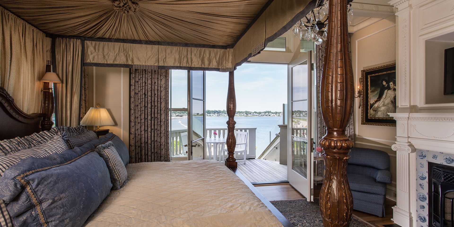 Bask in natural light and ocean breezes in your sand, sea, and sky-toned Martha's Vineyard Guest Room. Wake beside a glowing fireplace in a full-canopied four-poster king bed decorated with plush linens inside your private ocean villa