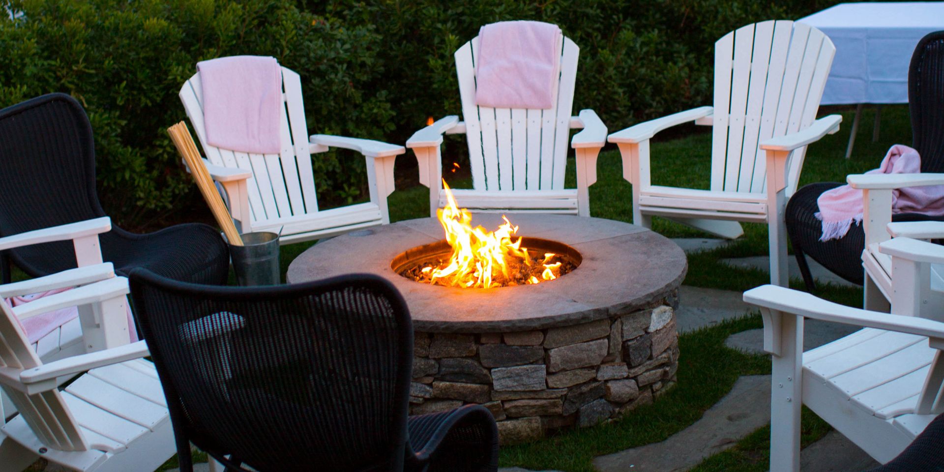 A Group Of Lawn Chairs Sitting On Top Of A Picnic Table