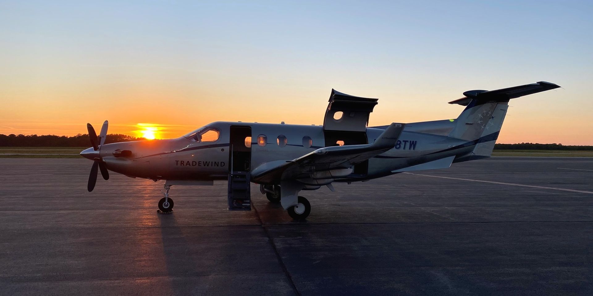 A Plane Sitting On Top Of A Runway