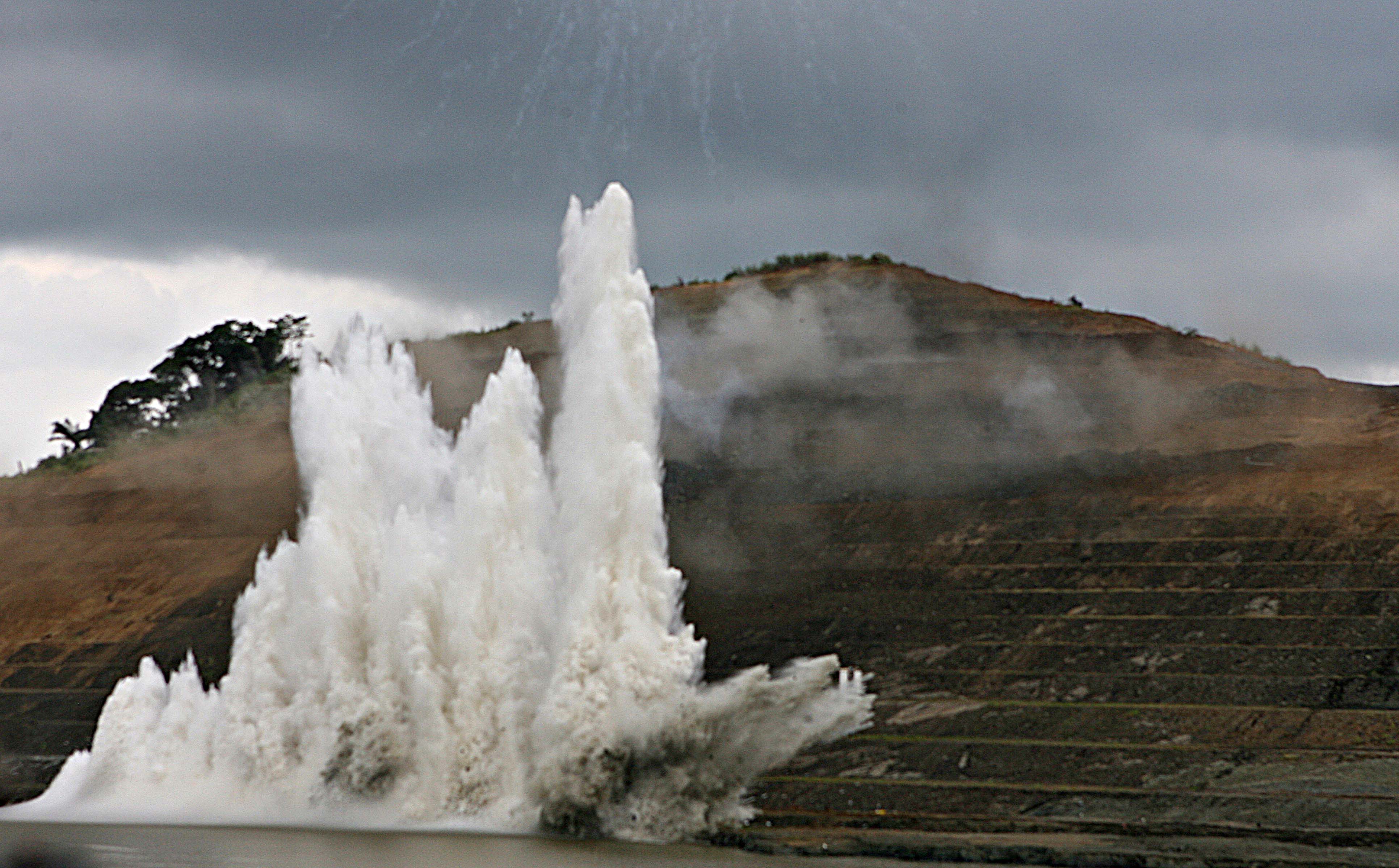 A controlled explosion sends water into the air in the Panama Canal during a Sept. 3, 2007 event celebrating the 30th anniversary of the 1977 treaty signed by then-President Jimmy Carter and Panamanian leader Omar Torrijos to transfer possession the canal to Panama at midnight Dec. 31, 1999. Photo by Susana Gonzalez/Bloomberg via Getty Images