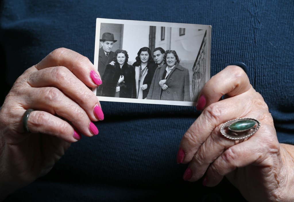 Auschwitz death camp survivor Erzsebet Brodt holds a picture of her family, who were all killed in the concentration camp during World War II