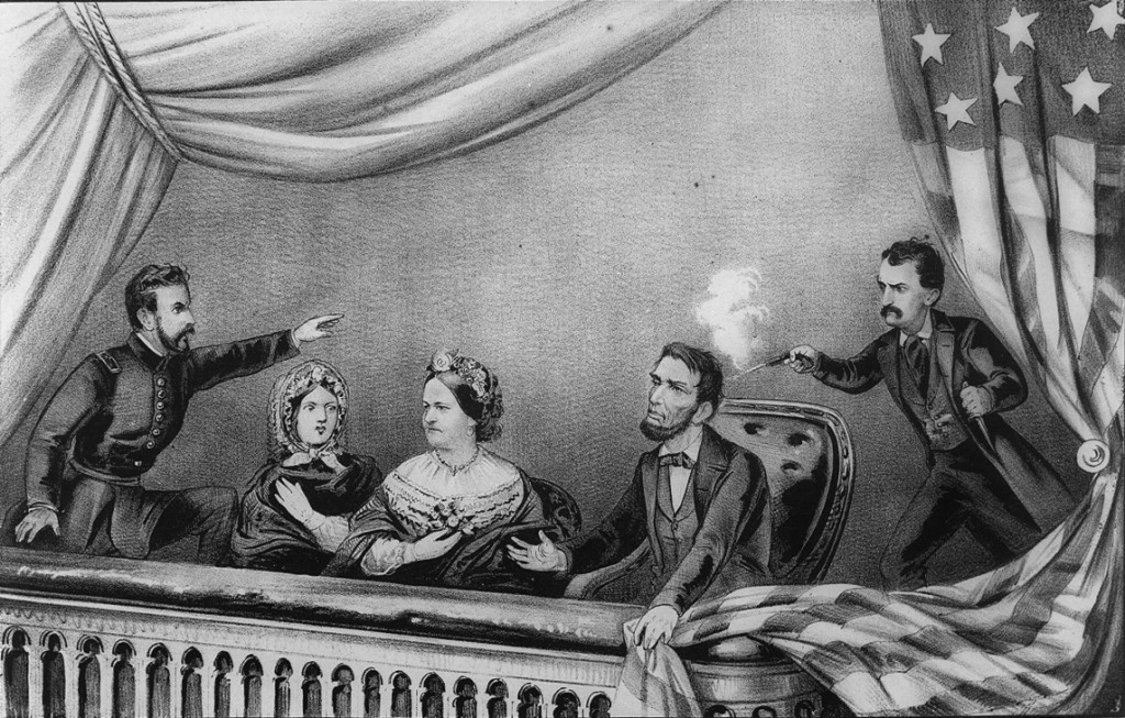 Lithograph of the Assassination of Abraham Lincoln. From left to right: Henry Rathbone, Clara Harris, Mary Todd Lincoln, Abraham Lincoln, and John Wilkes Booth. Rathbone is depicted as spotting Booth before he shot Lincoln and trying to stop him as Booth fired his weapon. Rathbone actually was unaware of Booth’s approach, and reacted after the shot was fired. While Lincoln is depicted clutching the flag after being shot, it is also possible that he just simply pushed the flag aside to watch the performance. From the Library of Congress