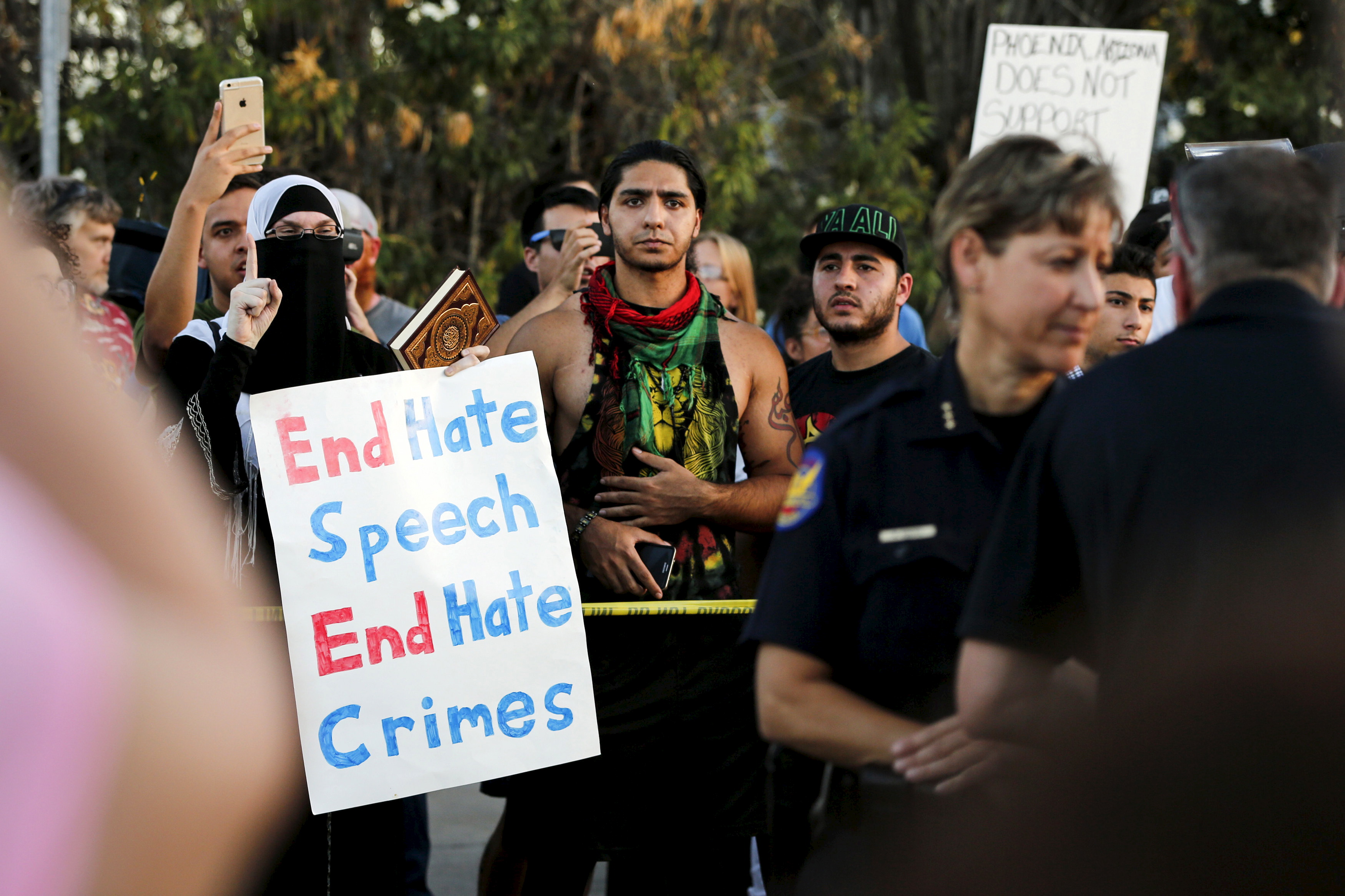 People counter the "Freedom of Speech Rally Round II" outside the Islamic Community Center of Phoenix, Arizona on May 29, 2015. Photo by Nancy Wiechec/Reuters.