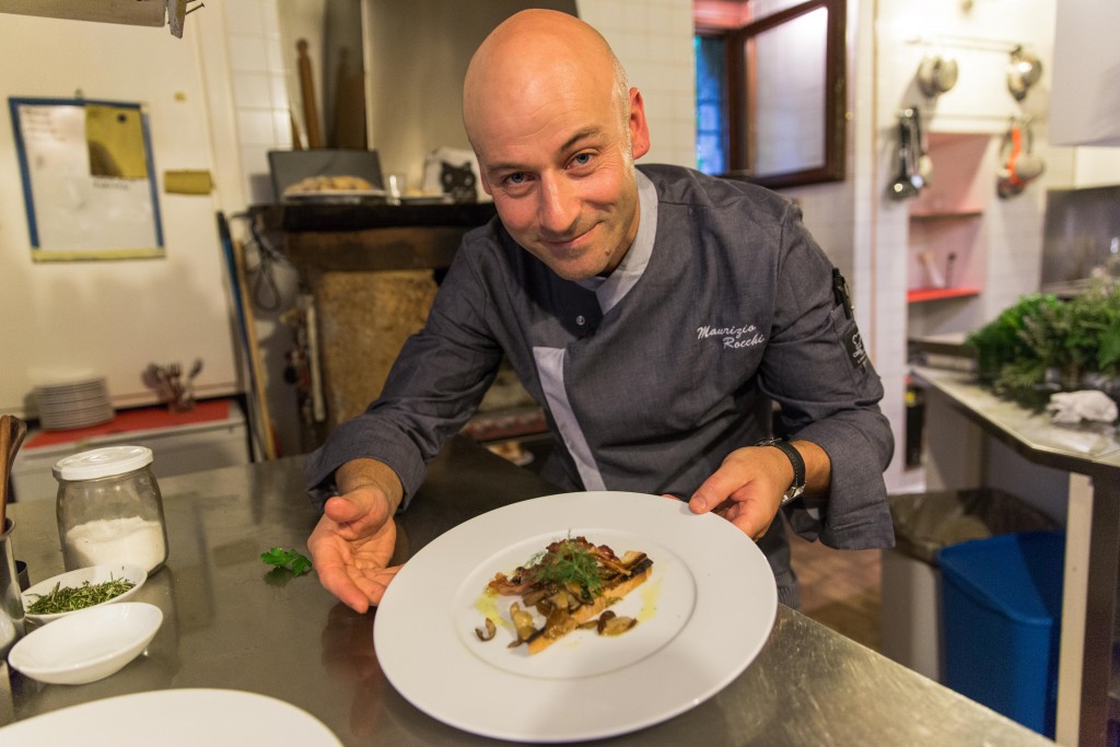 Chef Maurizio Rocchi shows off one his family recipes, featuring bacon, egg yolk and black truffle flakes. He is one of the few year-round residents here, and has opened a new restaurant, the Alma Civita, to capitalize on the growth in tourism. Photo by Frank Carlson