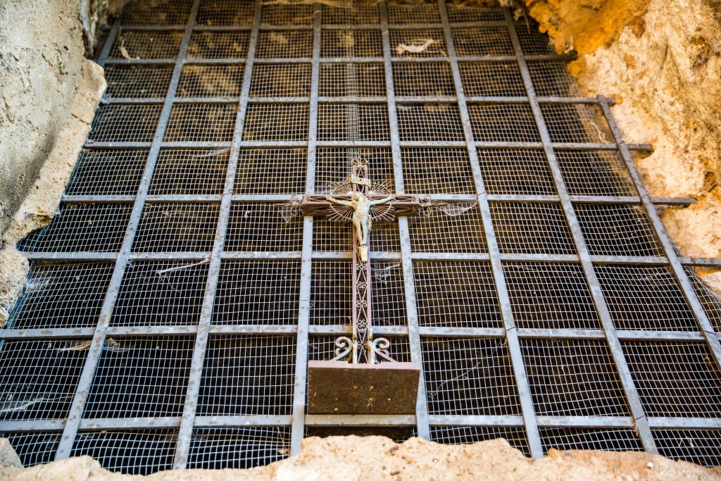 A cave underneath Civita di Bagnoregio houses an old chapel and may have been used as a tomb during the Etruscan era. Photo by Frank Carlson