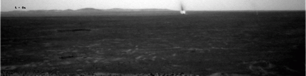 Several dust devils moving from right to left across a plain inside Mars' Gusev Crater. Photo by NASA's Mars Exploration Rover Spirit