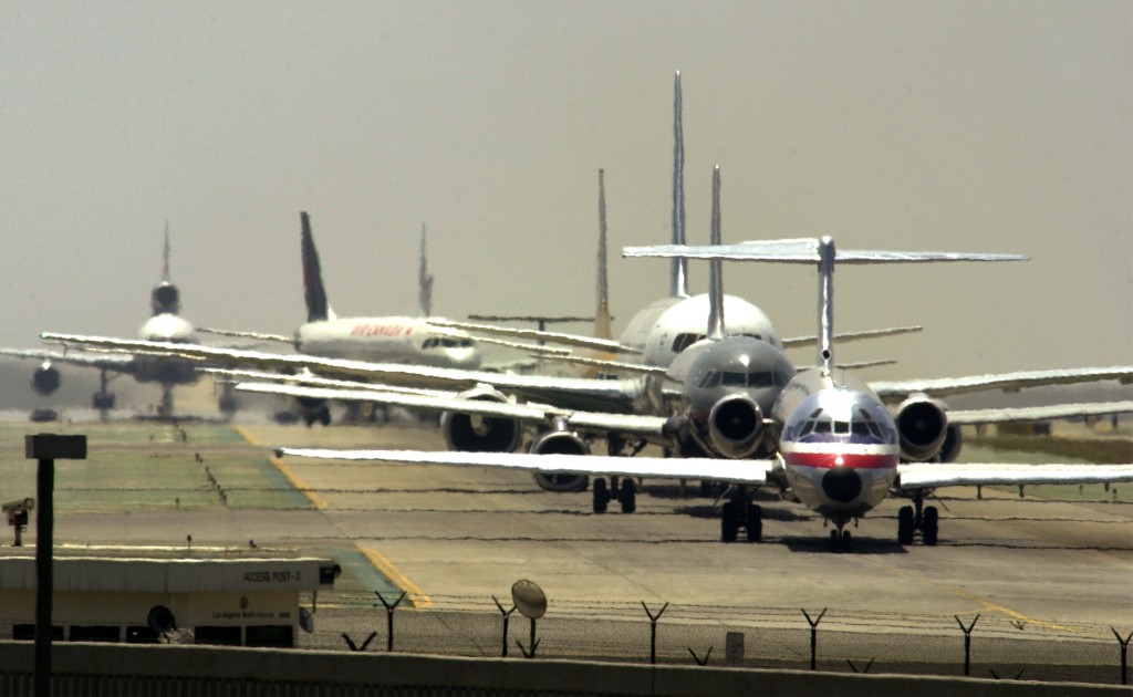 Airliners line up for take off at Los Angeles International Airport June 20, 2001 in Los Angeles, California. Photo by David McNew/via Getty Images