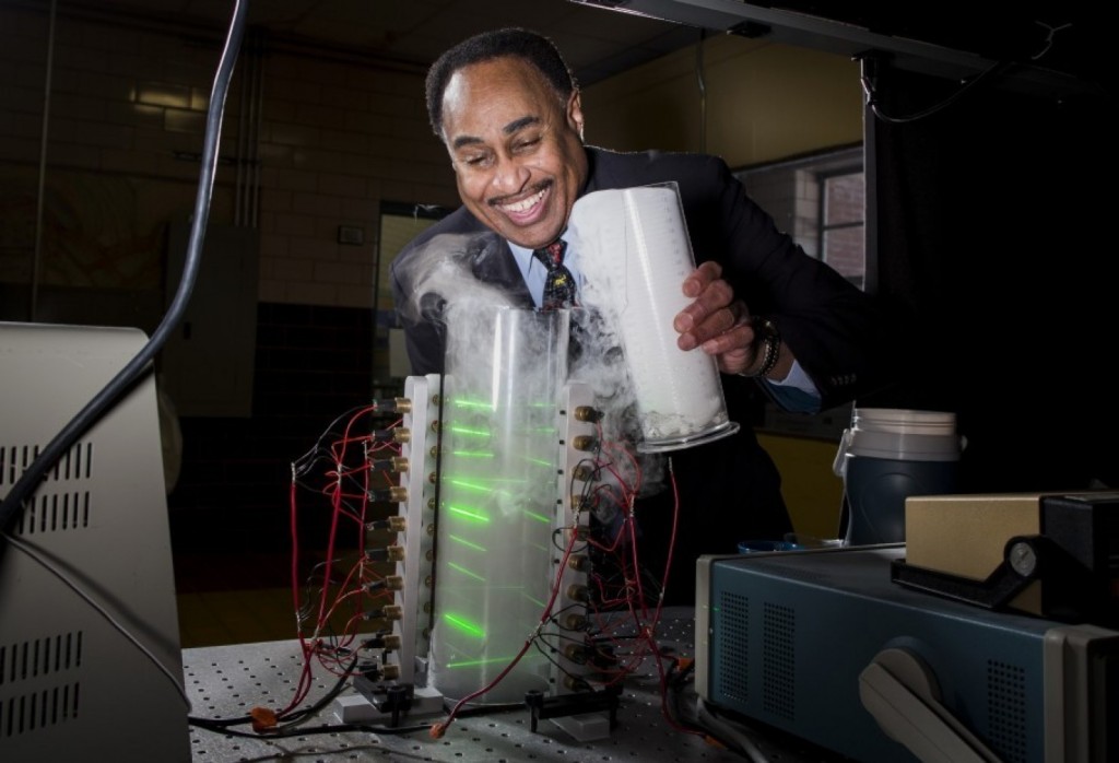 A mock prototype of space-twisting ring laser device devised by Ronald Mallett and Chandra Roychoudhuri. The demonstration model (a.k.a. not the real thing) is based on Mallett's research into how circulating laser light might twist space and time and lead to the possibility of time travel to the past and the future. Photo by Scott Eisen 