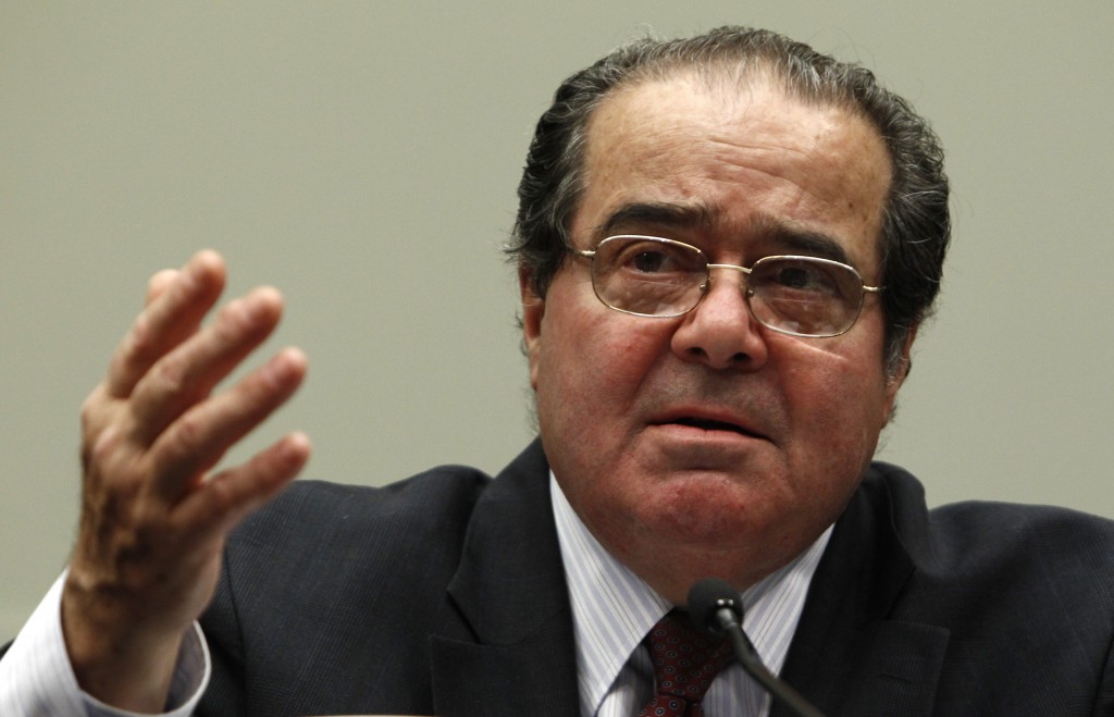 Supreme Court Justice Antonin Scalia testifies before a House Judiciary Commercial and Administrative Law Subcommittee hearing on ?The Administrative Conference of the United States? on Capitol Hill in Washington May 20, 2010. REUTERS/Kevin Lamarque (UNITED STATES - Tags: POLITICS HEADSHOT) - RTR2E5RR