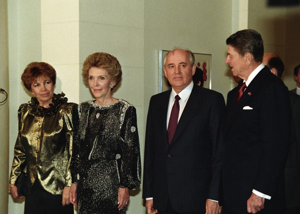 President Reagan and the First Lady nancy Reagan welcome Soviet president Mikhail Gorbachev and his wife Raisa in 1987. Photo by Sovfoto/UIG via Getty Images