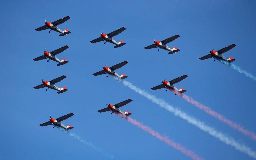 Philippine Air Force jets perform a fly-by during the Independence Day celebration in Manila on June 12, 2016. Photo by Erik De Castro/Reuters