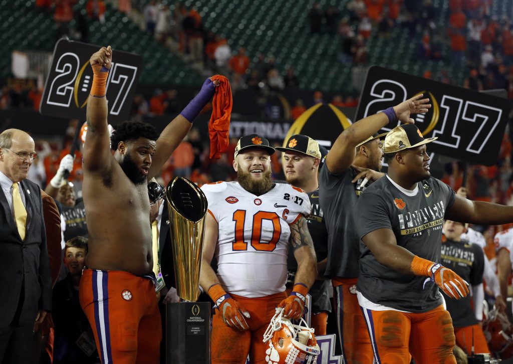 Clemson Tigers linebacker Ben Boulware (10) celebrates with teammates after defeating the Alabama Crimson Tide in the 2017 College Football Playoff National Championship Game at Raymond James Stadium. Photo by Kim Klement-USA TODAY Sports
