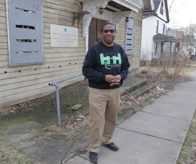 Rev. Paul Gordon Carter stands in front of the A.M.E. Zion Church, where Harriet Tubman once worshiped. The church is now a part of the national park, and will be refurbished in the coming years. Michael D. Regan/PBS NewsHour 