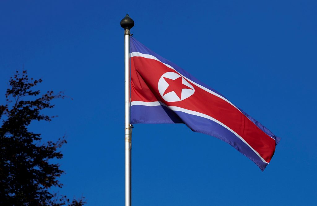 A North Korean flag flies on a mast at the Permanent Mission of North Korea in Geneva in 2014. Photo by Denis Balibouse/Reuters