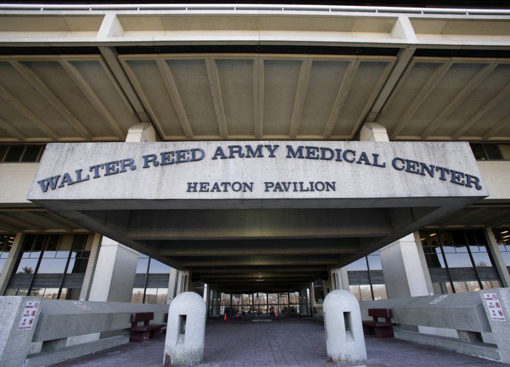 A general view shows the main entrance of Walter Reed Army Medical Center in Washington February 9, 2007. Walter Reed has treated more than 7,400 troops wounded in the Iraq and Afghanistan wars. Many needed long-term outpatient care and the hospital struggled to keep track of them, get them to appointments, and guide them through the bureaucracy. Picture taken February 9, 2007. To match feature USA-MILITARY/WALTERREED REUTERS/Yuri Gripas (UNITED STATES) - GM1DXHJICPAA