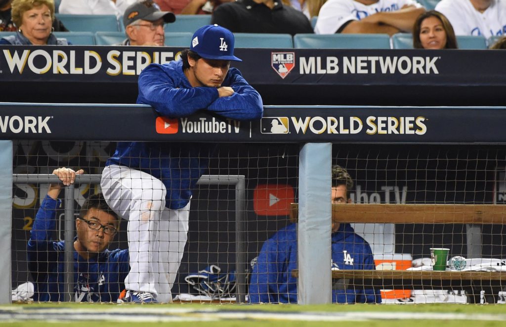 Los Angeles Dodgers starting pitcher Yu Darvish reacts in the 9th inning against the Houston Astros in game seven of the 2017 World Series at Dodger Stadium. Mandatory Credit: Jayne Kamin-Oncea-USA TODAY Sports