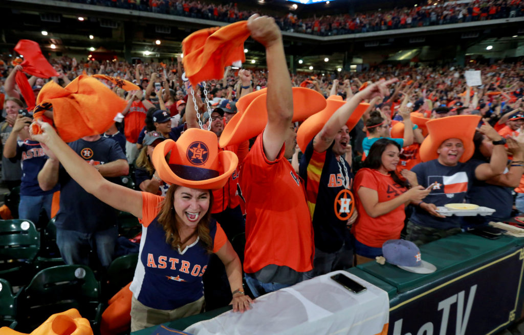 Houston Astros fans watch and cheer as their team plays in Los Angeles during a World Series Game Seven watch party at Minute Maid Park in Houston, Texas, U.S. November 1, 2017. REUTERS/Richard Carson