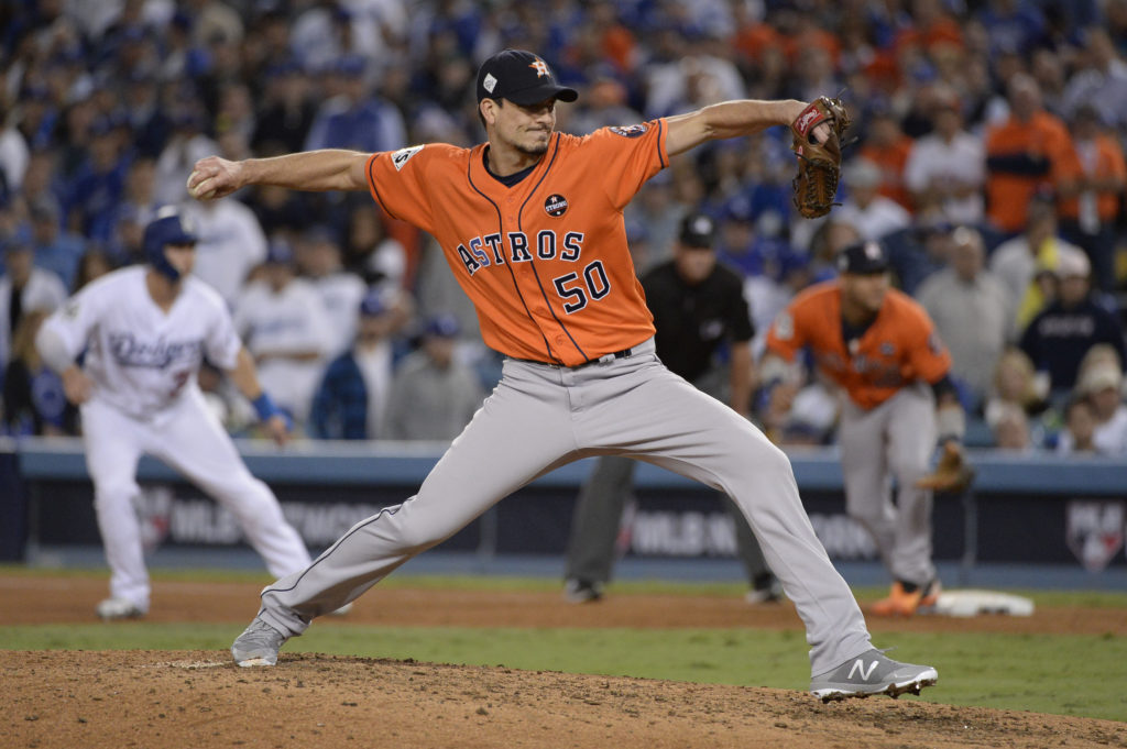 Houston Astros pitcher Charlie Morton throws a pitch against the Los Angeles Dodgers in the 6th inning in game seven of the 2017 World Series at Dodger Stadium.