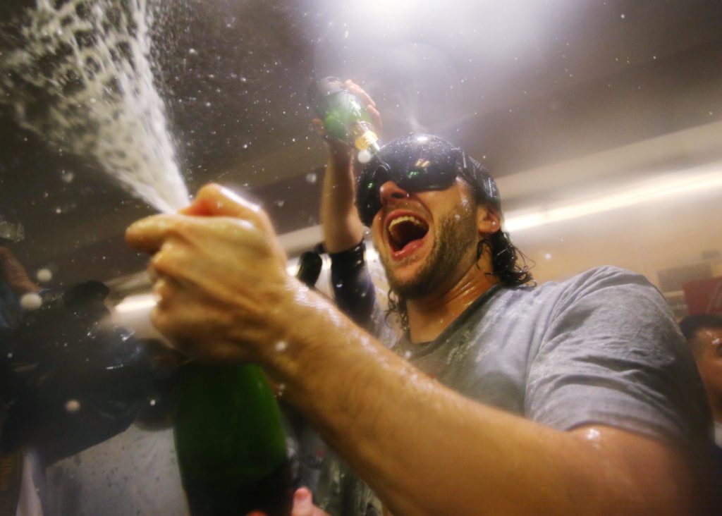 Houston Astros right fielder Josh Reddick celebrates in the clubhouse after defeating the Los Angeles Dodgers in game seven of the 2017 World Series at Dodger Stadium. Mandatory Credit: Gary A. Vasquez-USA TODAY Sports