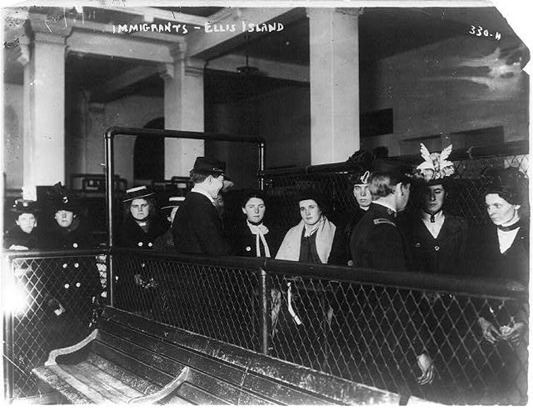 Immigrants on Ellis Island. Photo via Library of Congress Prints and Photographs Division