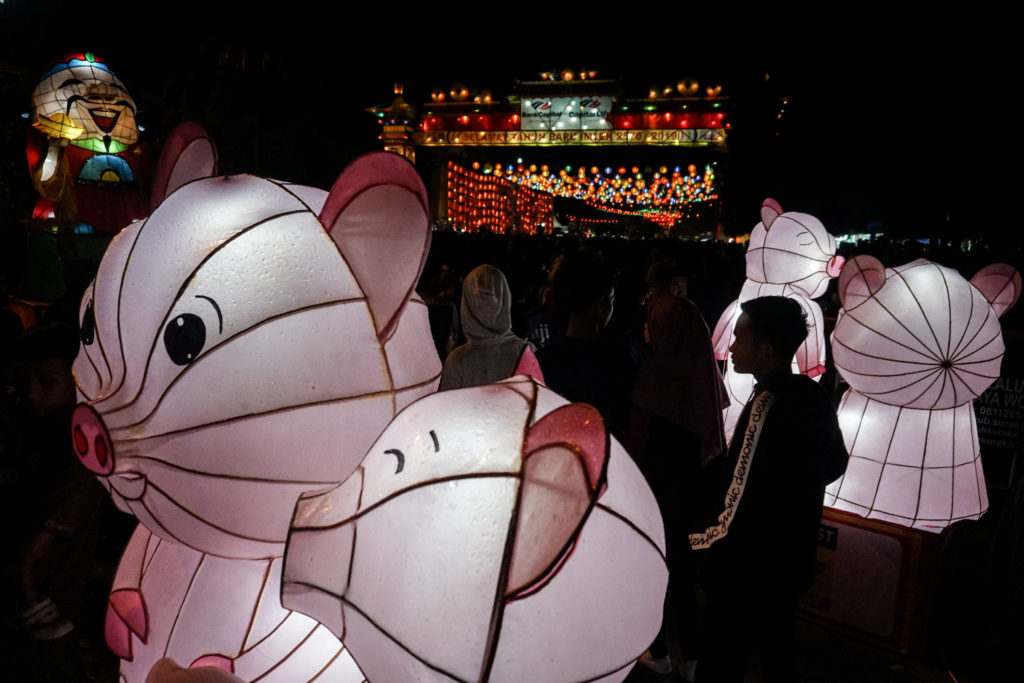 A man walks at Gede market decorated with lanterns during Chinese Lunar New Year's eve in Solo, Central Java province, Indonesia, on February 4, 2019. Photo by Antara Foto/Mohammad Ayudha/ via Reuters