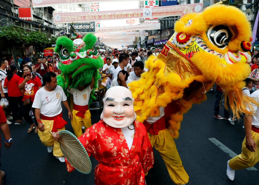 People perform Chinese Lion dance in Chinatown during the Chinese Lunar New Year in Bangkok, Thailand. Photo by Soe Zeya Tun/Retuers