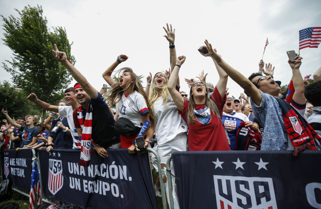 Fans celebrate a United States goal against Netherlands during a watch party for the FIFA Women's World Cup final match at Lincoln Park. By drawing in more fans, the U.S. women's team says it has generated more revenue for U.S. Soccer. Photo by Kamil Krzaczynski-USA TODAY Sports