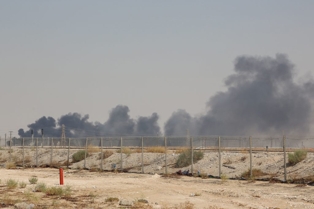 Smoke billows from an Aramco oil facility in Abqaiq about 60km (37 miles) southwest of Dhahran in Saudi Arabia's eastern province on September 14, 2019. - Drone attacks sparked fires at two Saudi Aramco oil facilities early today, the interior ministry said, in the latest assault on the state-owned energy giant as it prepares for a much-anticipated stock listing. Yemen's Iran-aligned Huthi rebels claimed the drone attacks, according to the group's Al-Masirah television. Photo by /AFP/Getty Images