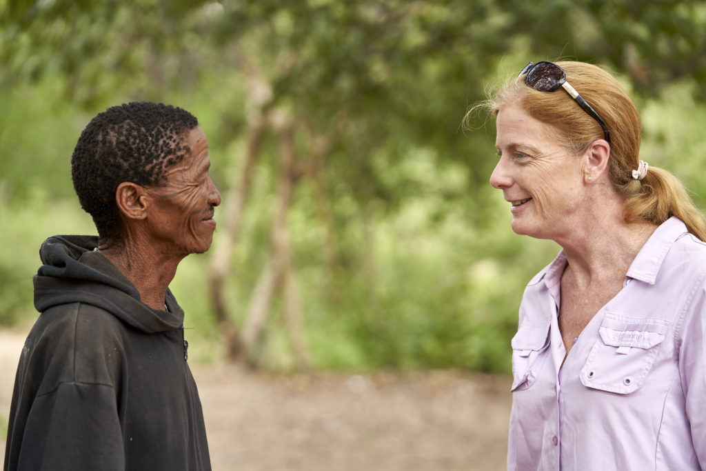 Vanessa Hayes discussing the significance of the Makgadikgadi-Okavango region with Headman ǀkun ǀkunta from an extended Ju/’hoansi family. Living within the homeland region of the greater Kalahari of Namibia, Vanessa has been visiting ǀkun and his extended family for over a decade. /kun was one of the many participants who donated his mitogenome to this study. Photo by Chris Bennett, Evolving Picture, Sydney, Australia