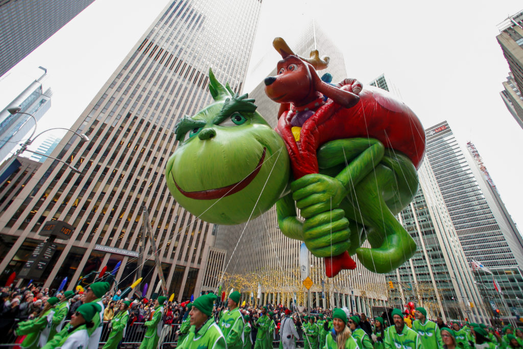 The Dr Seuss’ The Grinch balloon is carried during the 93rd Macy's Thanksgiving Day Parade in New York, U.S., November 28, 2019. Photo by Caitlin OchsReuters