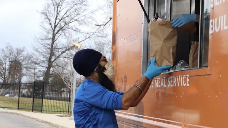 Sikh Americans delivering groceries and meals in Detroit, Mich.