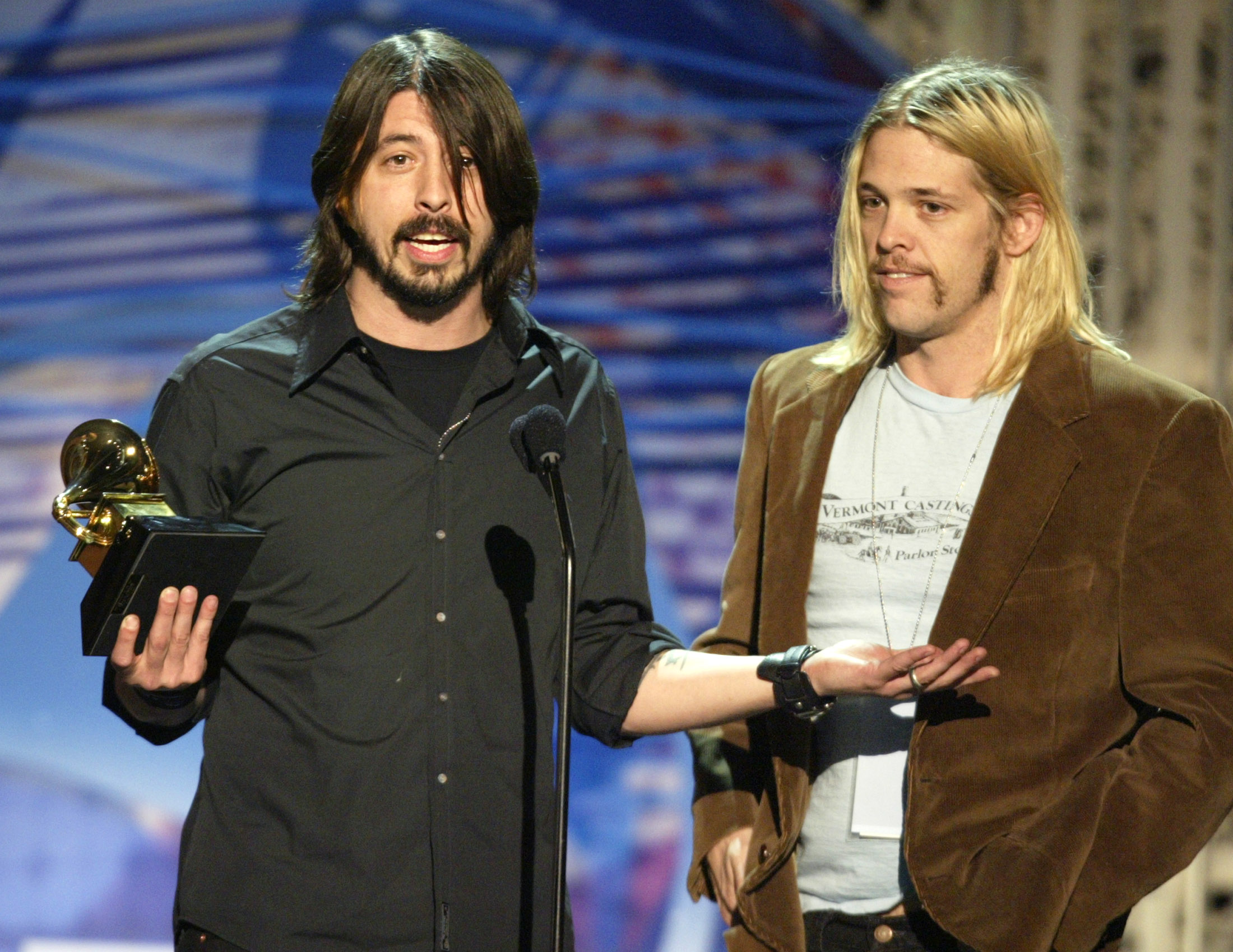 FOO FIGHTERS DAVE GROHL HOLDS GRAMMY FOR BEST ROCK ALBUM.