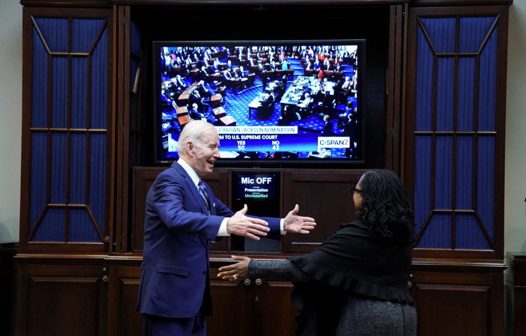 U.S. President Joe Biden greets his Supreme Court nominee Judge Ketanji Brown Jackson as they watch the full U.S. Senate vote on Jackson's nomination to the U.S. Supreme Court, from the Roosevelt Room at the White House in Washington, U.S., April 7, 2022. If confirmed, Jackson would become the first Black woman to serve on the Supreme Court. Photo by Kevin Lamarque/REUTERS