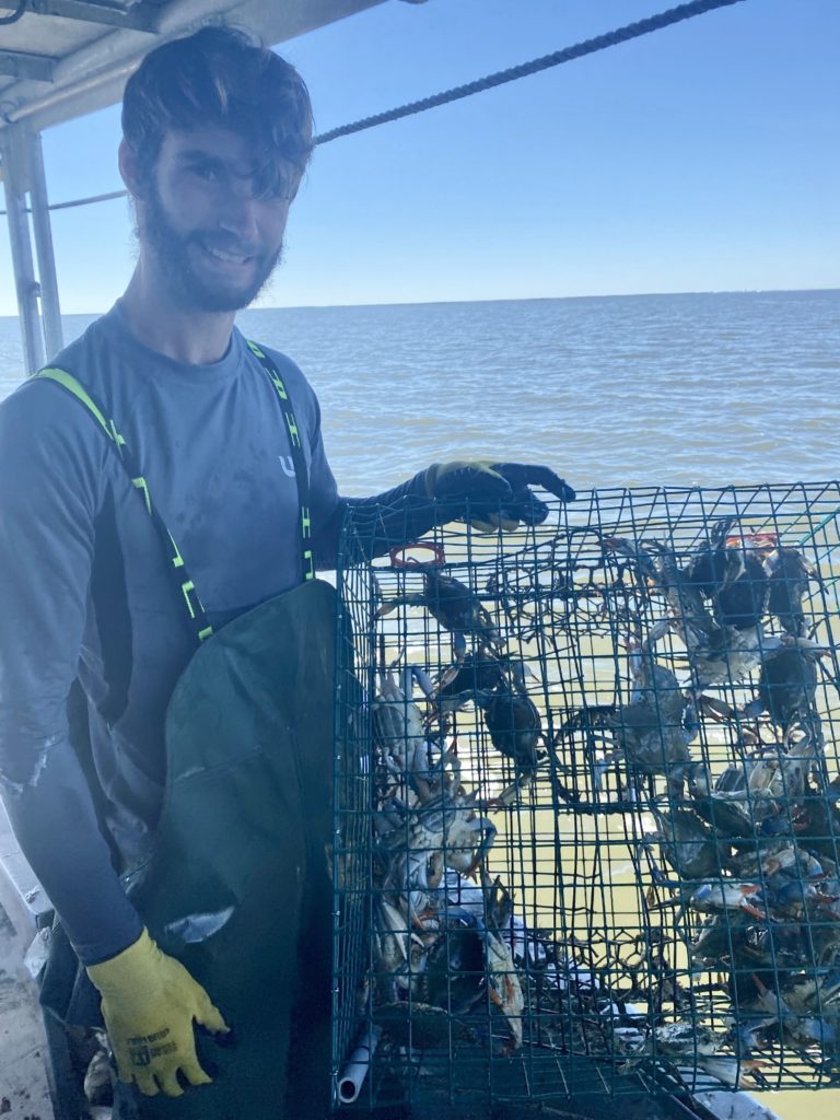 Fisherman from Barataria Bay, La. shows off crab trap.