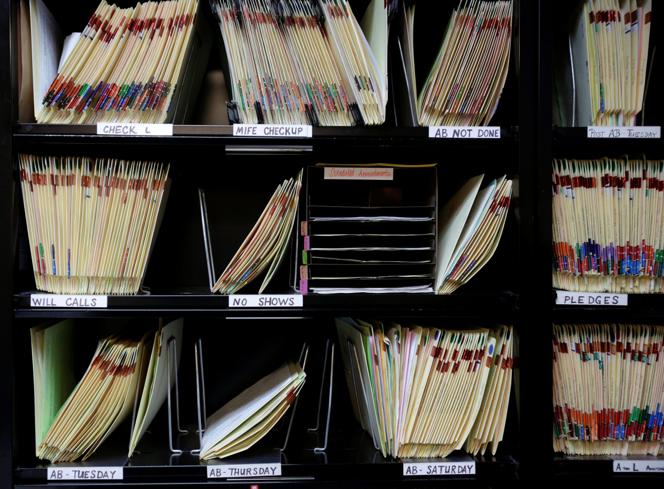 Patients' files are organized on a shelf at the Hope Medical Group for Women in Shreveport