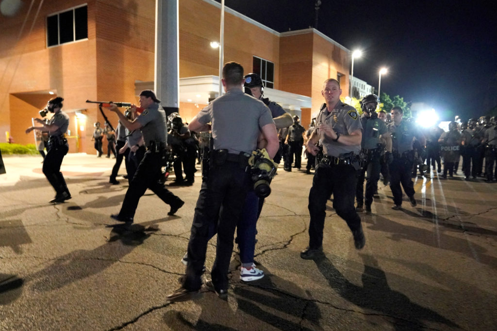 Oklahoma City Police officers arrest a person during a protest following the Minneapolis Police killing of George Floyd, May 31, 2020. REUTERS/Nick Oxford