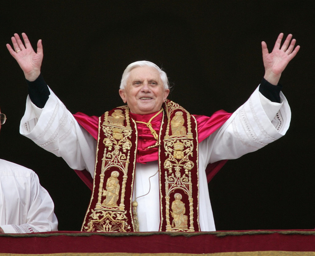 FILE PHOTO: Pope Benedict XVI, Cardinal Joseph Ratzinger of Germany, waves from a balcony of St. Peter's ...