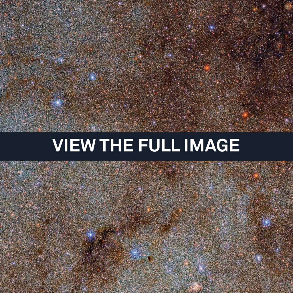 This image, which is brimming with stars and dark dust clouds, is a small extract — a mere pinprick — of the full Dark Energy Camera Plane Survey (DECaPS2) of the Milky Way. The new dataset contains a staggering 3.32 billion celestial objects — arguably the largest such catalog so far. The data for this unprecedented survey were taken with the US Department of Energy-fabricated Dark Energy Camera at the NSF’s Cerro Tololo Inter-American Observatory in Chile, a Program of NOIRLab. Photo provided by DECaPS2/DOE/FNAL/DECam/CTIO/NOIRLab/NSF/AURA