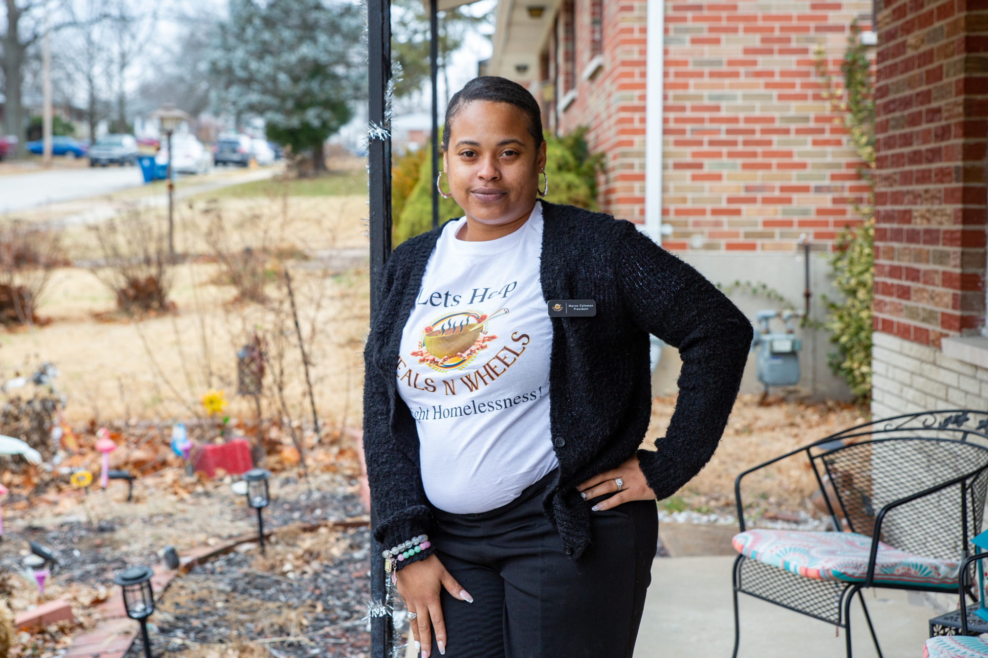 A portrait of Marna Coleman, who spent her first night without housing in St. Louis more than a decade ago. She’s wearing a shirt that dons the logo to Meals N Wheels, a nonprofit that helps veterans experiencing homelessness in the St. Louis area.